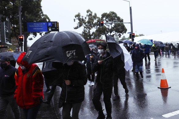 The rain did not deter many Sydneysiders from receiving their jab on Tuesday.