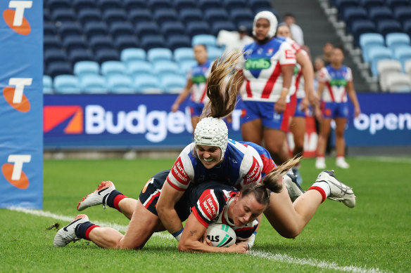 Samantha Bremner of the Roosters scores a try during the NRLW semi-final match between Sydney Roosters and Newcastle Knights.