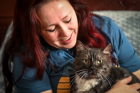 In from the cold: cat rescuer Claire Brookes with Fat Tony.