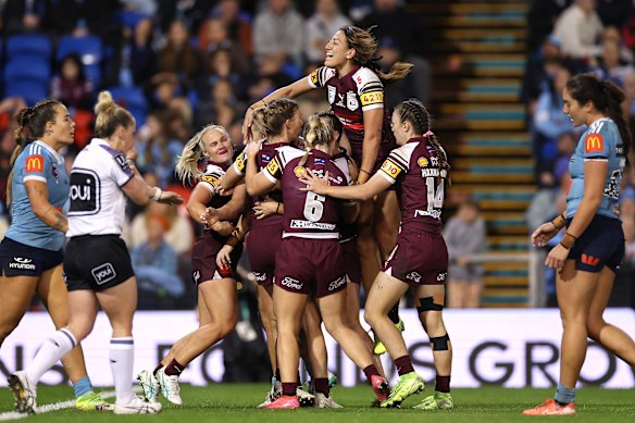 The Maroons celebrate Romy Teitzel’s try in last year’s Origin clash in Newcastle.