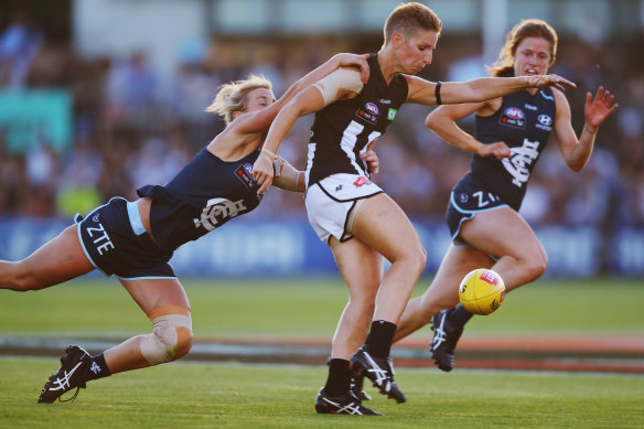 Emma Grant in action during her playing days at Collingwood.