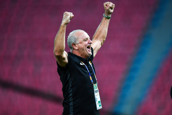 Graham Arnold celebrates Australia's qualification for Tokyo 2020 after the Olyroos' win over Uzbekistan in January.