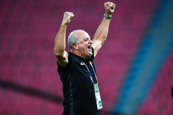 Graham Arnold celebrates Australia's qualification for Tokyo 2020 after the Olyroos' win over Uzbekistan.