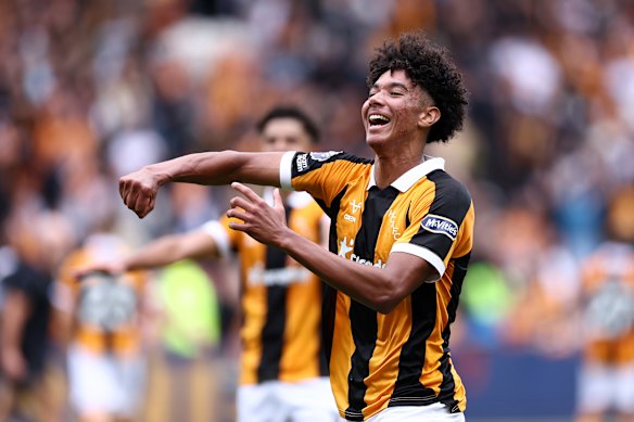 Lucas Herrington celebrates Hull’s win over Manchester United.
