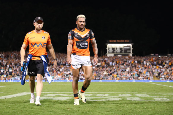 Api Koroisau gets a hero’s reception as he leaves the field.