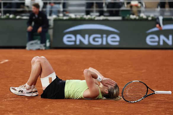 Maja Chwalinska of Poland celebrates winning match point.
