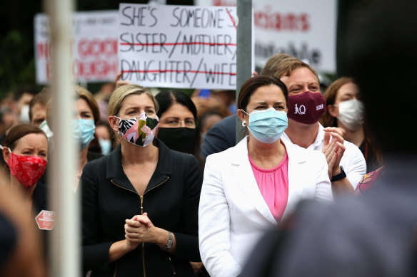 Queensland Attorney-General and Minister for the Prevention of Domestic and Family Violence Shannon Fentiman with Premier Annastacia Palaszczuk and other ministers during a 2021  march calling for action against gendered violence in federal Parliament.