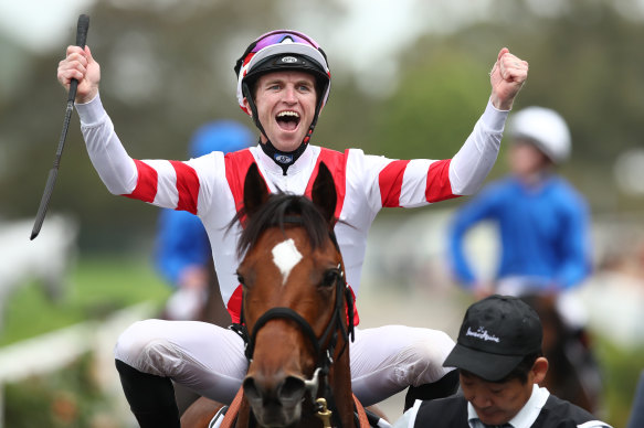 Josh Parr celebrates after riding Obamburumai to victory in the Golden Eagle at Rosehill on Saturday.