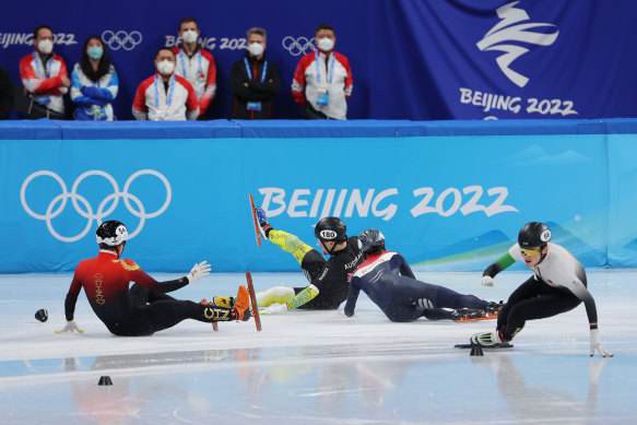 Australian speed skater Brendan Corey takes down China’s Ziwei Ren and Dutchman Itzhak de Laat during the men’s 1000m quarter-finals.