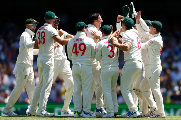 Pat Cummins celebrates a wicket on morning one at the SCG.