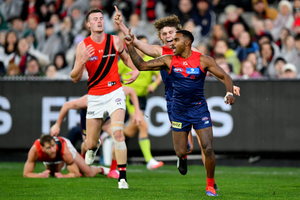 Kysaiah Pickett of the Demons celebrates kicking a goal.