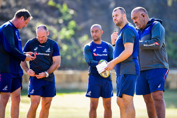 Mick Byrne with the 2019 Australia World Cup coaching team, including George Gregan, Michael Cheika and current Fiji coach Simon Raiwalui. 