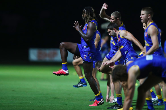 Leading from the front: Nic Naitanui and his teammates at training this week.