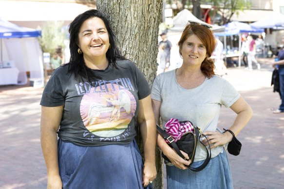 Kim Webeck (left), pictured with friend Neridah Stockley at Todd Mall markets in Alice Springs, says she is supporting Labor’s candidate for Lingiari, Marion Scrymgour, in the federal election.
