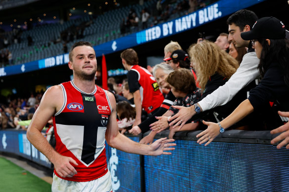 Brad Crouch celebrates with Saints fans after the win over Carlton.