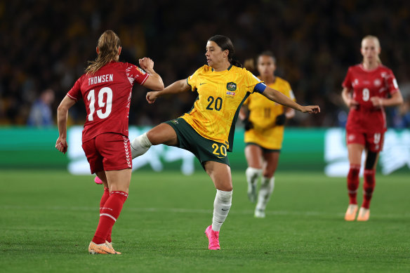 Sam Kerr beats the Danish defenders in her first minutes in the World Cup.