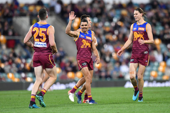 Charlie Cameron celebrates one his six goals as Lions thumped the Gold Coast Suns at the Gabba. 