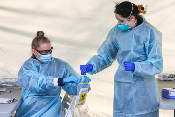 Paramedics at a COVID-19 pop-up testing centre in the Melbourne hotspot suburb of Brunswick West.