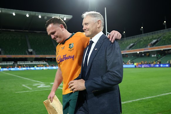 Angus Bell and Joe Schmidt leave the field in Perth.