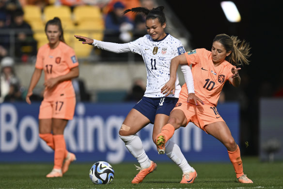 United States’ Sophia Smith and Netherlands’ Danielle Van de Donk, right, battle for the ball.