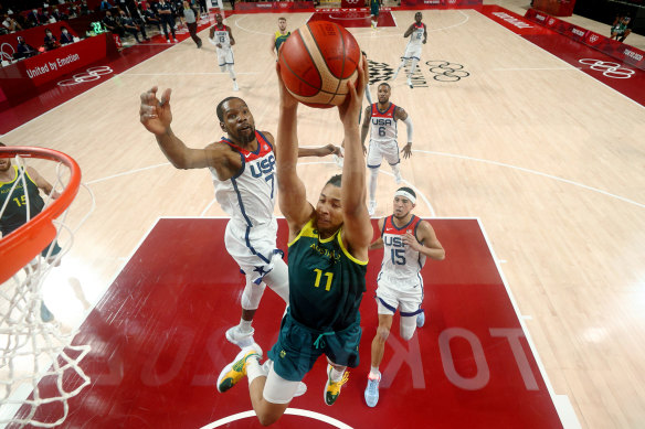 Dante Exum attempts a dunk.