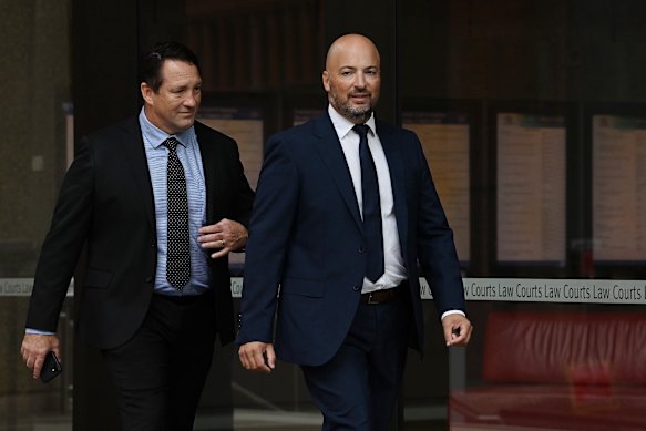 Parramatta Eels National Rugby League CEO Jim Sarantinos (right) and football manager Mark O’Bneill (left) arrive at the Supreme Court in Sydney on Monday.