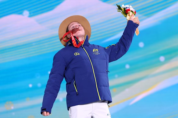 Ben Tudhope with his bronze medal at the 2022 Beijing Winter Paralympic Games where he was the only Australian snowboarder.