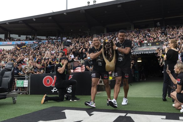 The Panthers bring home the trophy to adoring fans last year.