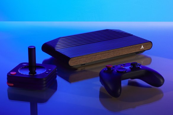 The Atari VCS evokes the original look of the 2600 with a wood front panel.