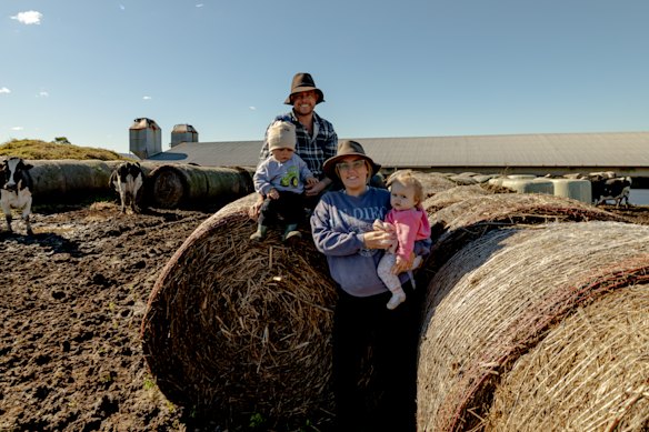 Dan and Krysten Wilson, with son Kolby 2, and daughter Kate, 1, on their Hinton dairy farm.