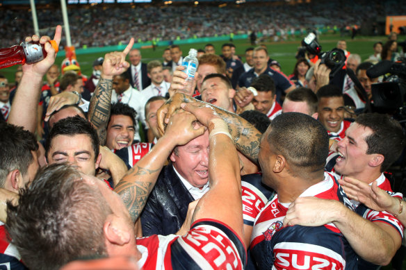 Trent Robinson and the Roosters celebrate grand final glory in 2013.