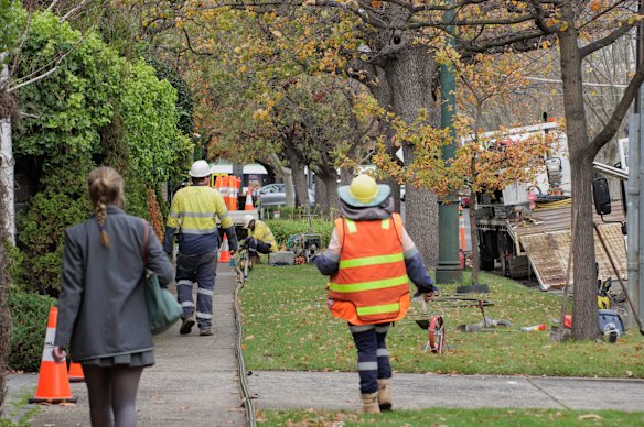 A steady stream of tradies arrive at St George’s Road, Toorak, where more than $250 million worth of residential renovations are transforming the leafy boulevard. 