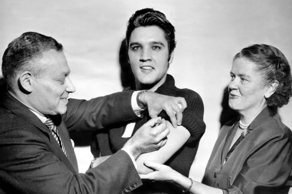 Elvis Presley receiving a polio vaccination backstage at the ’The Ed Sullivan Show in 1956.