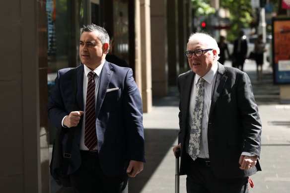 Former NSW deputy premier John Barilaro, left, and his barrister John Agius SC, right, arrive at the ICAC in Sydney on Monday.