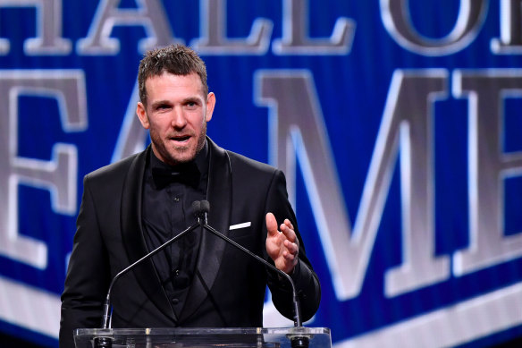 Dane Swan addresses the room.