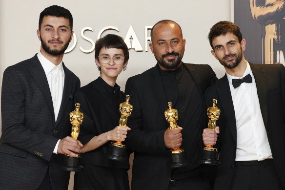 Hamdan Ballal (third from left) with Basel Adra (left), Rachel Szor, and Yuval Abraham won best documentary feature film for <i>No Other Land</i>, at the Oscars earlier this month.
