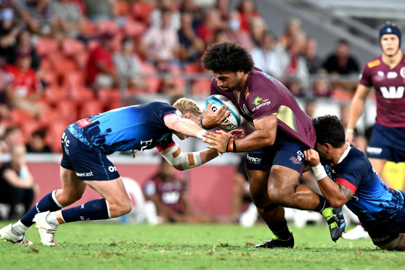 Zane Nonggorr takes on the Melbourne Rebels defence in last season’s round one Super Rugby Pacific match at Suncorp Stadium.