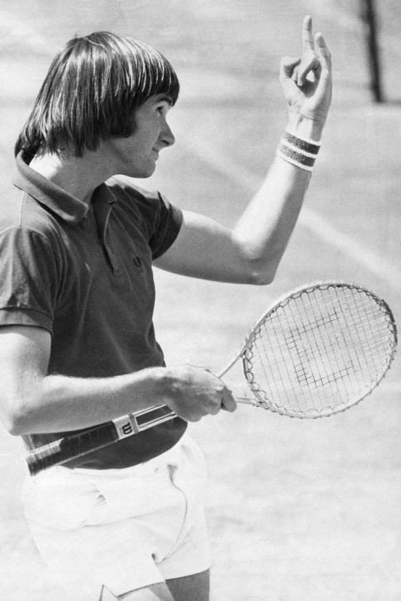 Connors makes gestures to the Australian Open crowd in 1974.