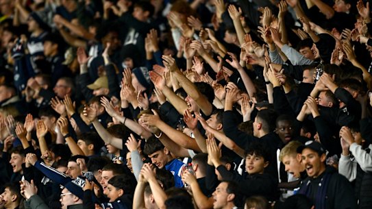 Victory fans chant before the A-League grand final.