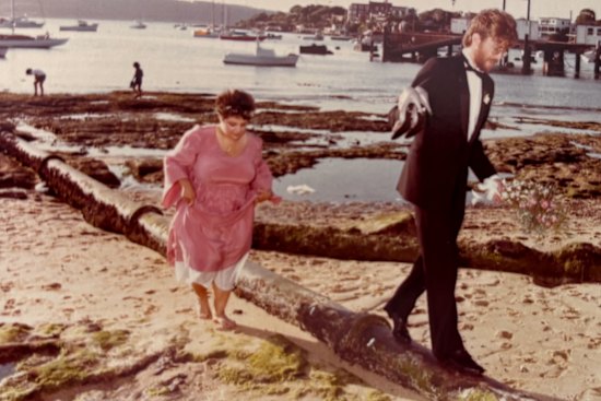 The barefoot bride: Jenna Price and her husband, John.