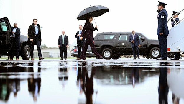Vice President Kamala Harris boards Air Force Two as she departs from Ellington Airport in Houston.