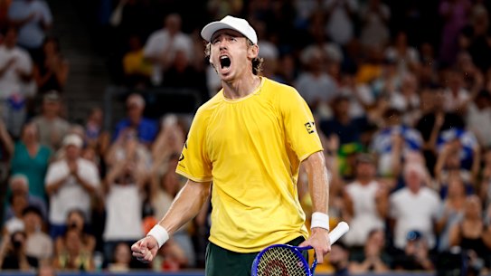 Alex de Minaur roars after winning his match against Hubert Hurkacz in the United Cup quarter-final.