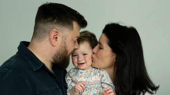 Edwina and Sean Bradstreet with their 16 month old daughter Scout who has survived brain cancer. Scientists were able to identify the specific genetic mutation behind her tumour and treat it with a therapy called an ALK inhibitor in Sydney. 6 June 2024 Photo: Janie Barrett