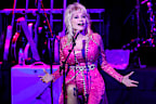 NASHVILLE, TENNESSEE - OCTOBER 24: Dolly Parton performs at the 2021 Kiss Breast Cancer Goodbye Concert at CMA Theater at the Country Music Hall of Fame and Museum on October 24, 2021 in Nashville, Tennessee. (Photo by Jason Kempin/Getty Images)