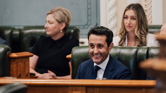 Prime Minister David Crisafulli and Youth Justice Minister Laura Gerber (behind right) will expand the LNP's Adult Crime, Adult Time laws to include mandatory sentences for children released on bail. 