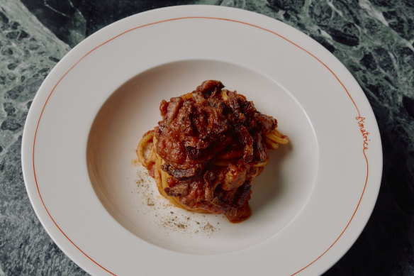 Caffe Amatrice offers the town’s signature sauce in two forms: baked with eggs and tangled through spaghetti. 