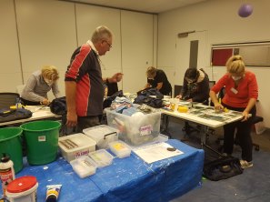 Students practising replacing broken tiles in an I’m Still Learning class at Avondale Heights library.