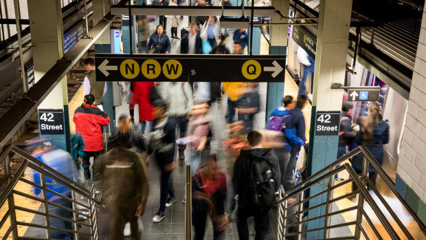 Commuters exit a Times Square subway station in New York last week. More than 64 million passengers go through the station annually.