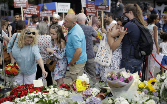 Londoners lay flowers after a minute's silence on London Bridge on Sunday.