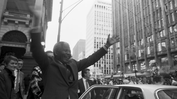 Nelson Mandela arrives at the Melbourne Town Hall in 1990.